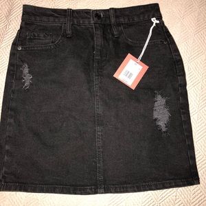 Black jean skirt with tags! Size 00.